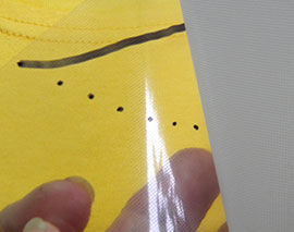 Peeling the backing off the transfer sheet